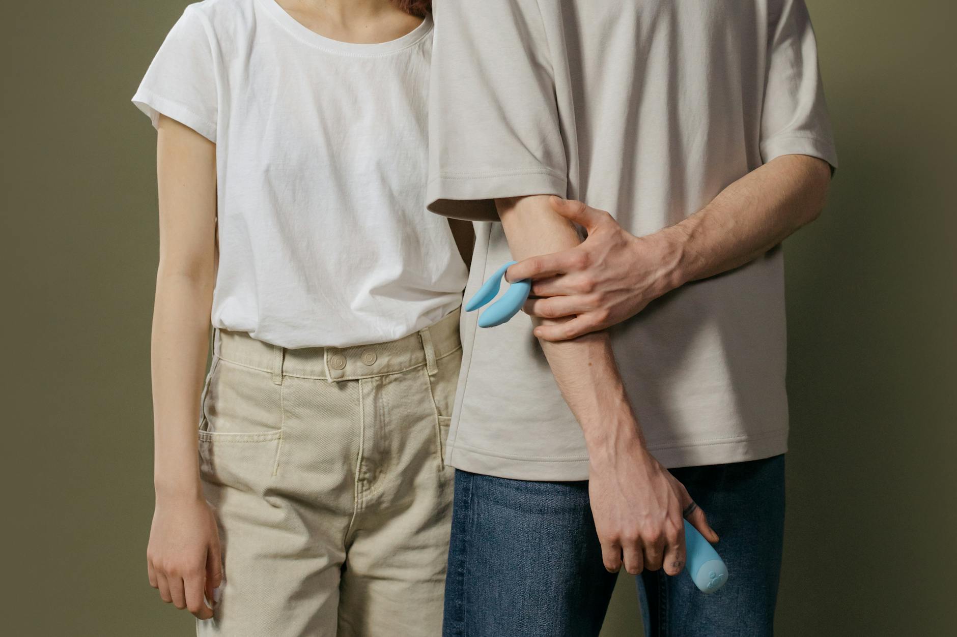 A couple exploring intimacy together with modern toys and communication